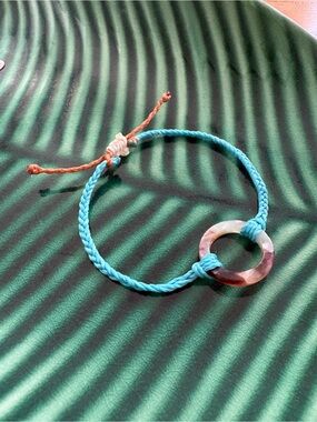 Handcrafted Beach Boho Wax String Bracelet with Marbled Ring Pendant